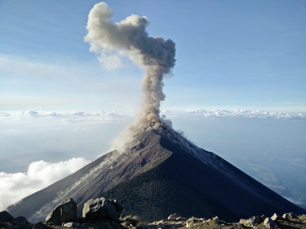 volcano plumes on top of the mountain