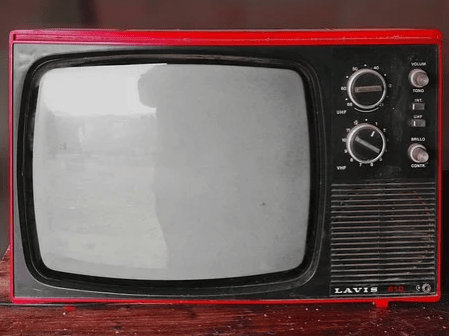 An old-fashioned TV set with dials