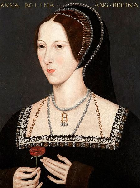 Anne Boleyn wearing a black dress and French hood