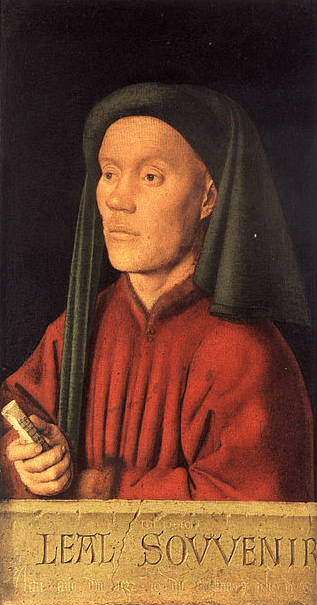 a man wearing a black hood and a red robe