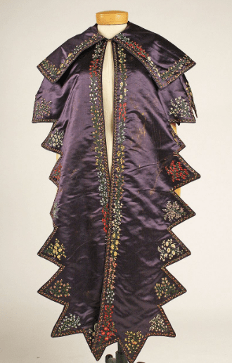 a purple silk pelerine