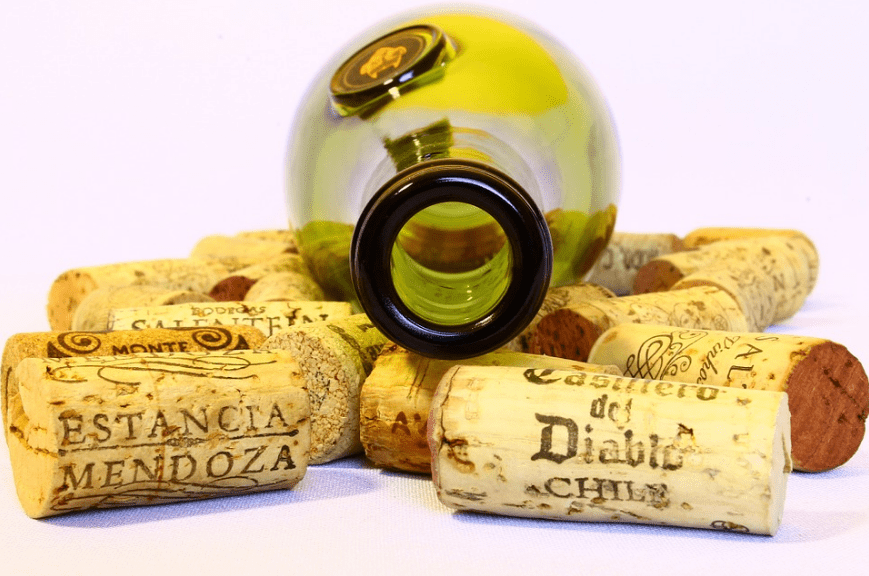 a wine bottle on top of corks