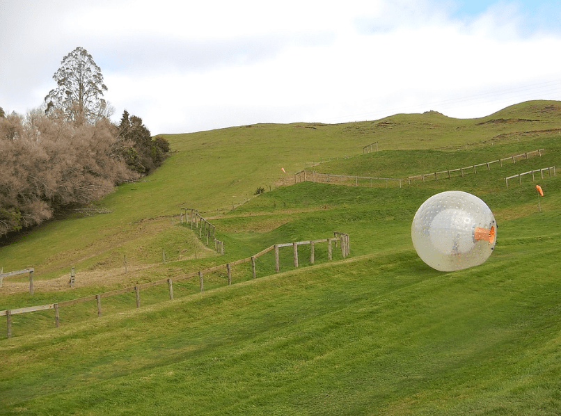 a zorb ball rolling down the hill
