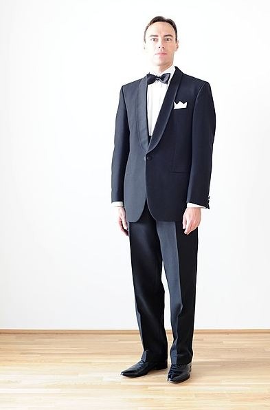 man wearing a black-tie outfit