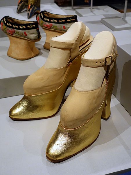 Platform shoes worn by Mae West, 1950s AD, wood, metallic leather - Textile Museum, George Washington University