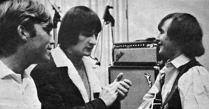 Producer Terry Melcher (left) in the recording studio with Gene Clark (center) and David Crosby (right). Melcher brought in session musicians to play on the "Mr. Tambourine Man" single because he felt that the Byrds hadn't yet gelled musically