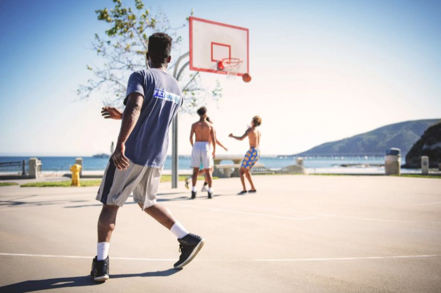 four-people-playing-basketball