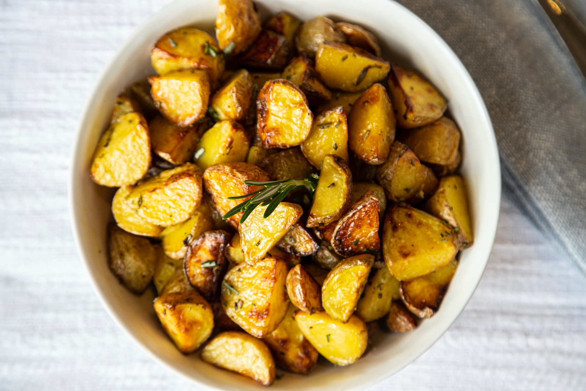 Potatoes require no peeling before cooking if you don't want to. The skin contains lots of fiber, minerals, vitamins, and antioxidant properties