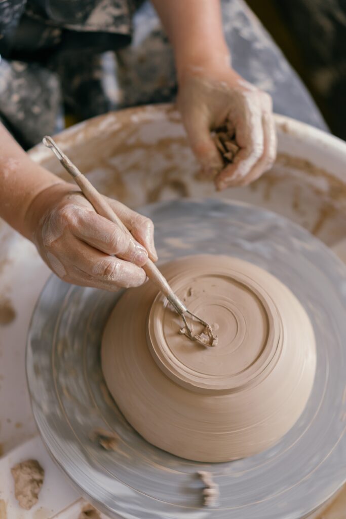 making a bowl pottery image