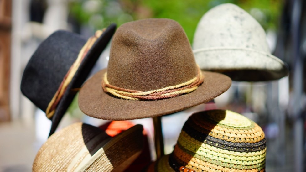 brown-fedora-hat-in-selective-focus-photography