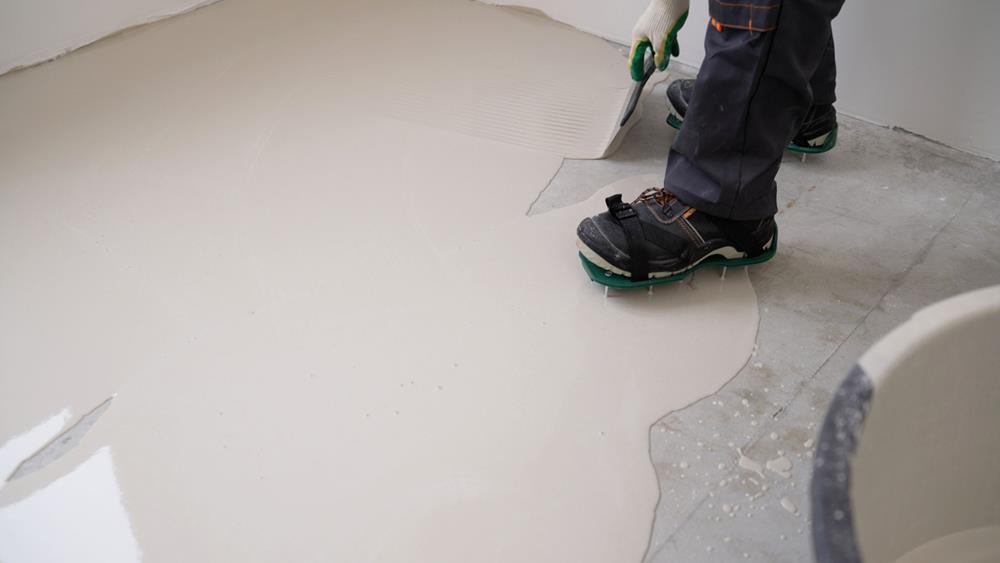 Spreading epoxy flooring