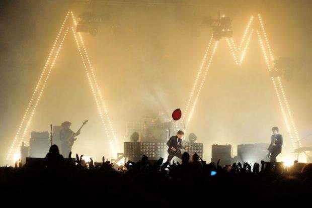 Arctic Monkeys performing at the InMusic Festival on 25 June 2013