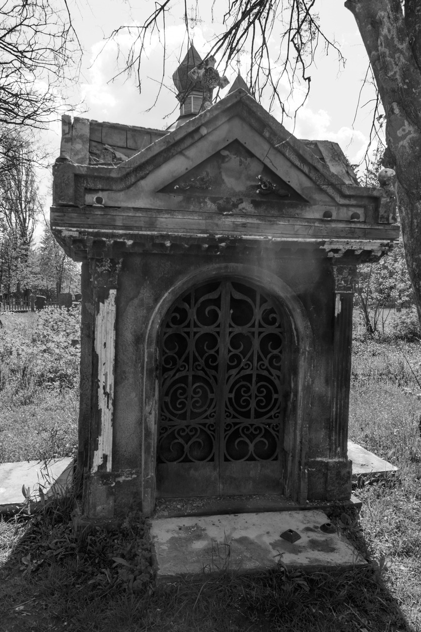 Old stone crypt on the ancient cemetery Black and white tone