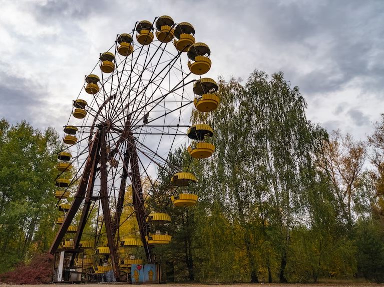 yellow abandoned ferris wheel