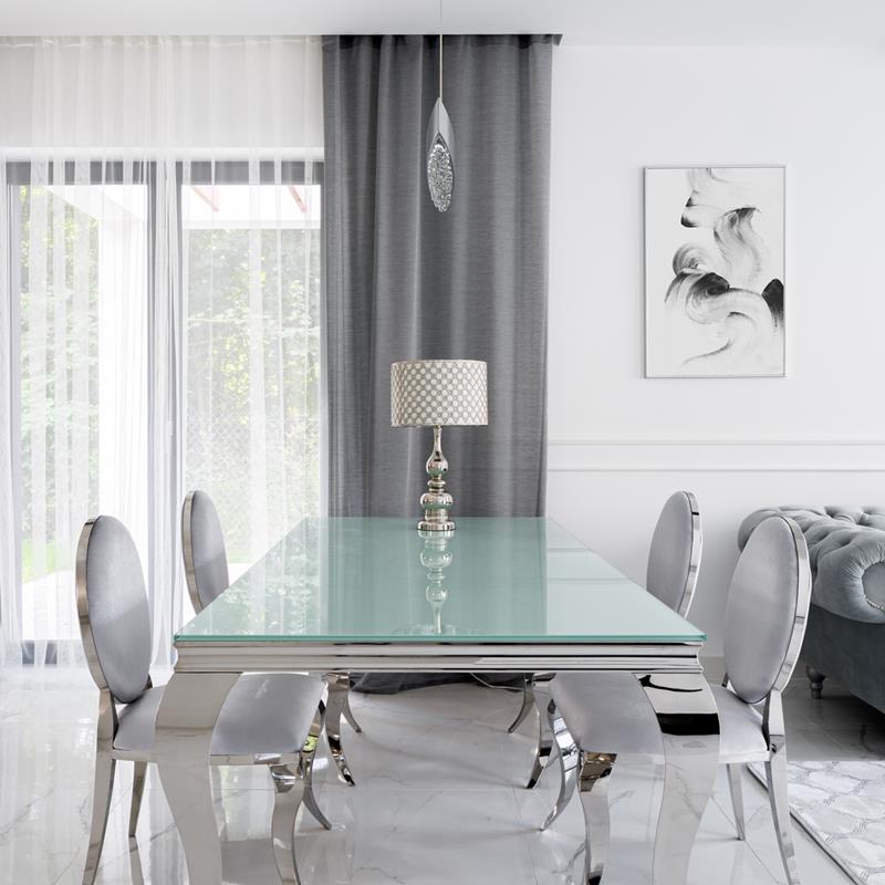 An elegant dining table with glass top