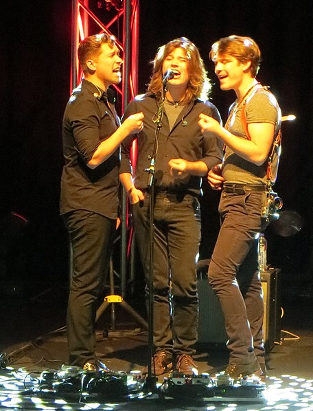 Hanson performing in 2013