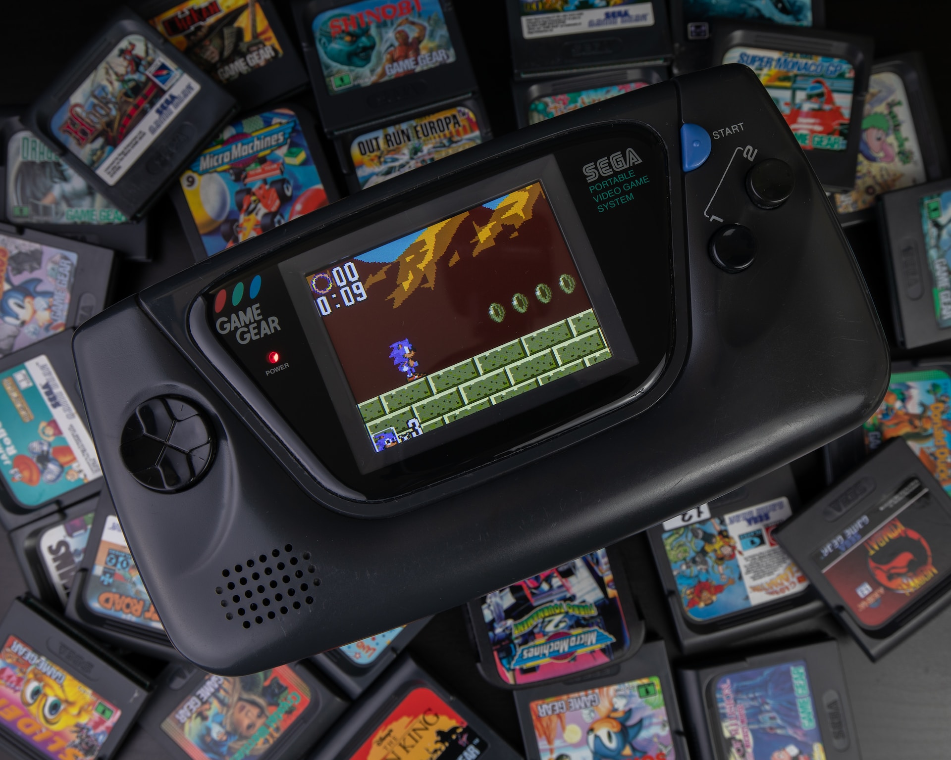 black game gear with games at the background