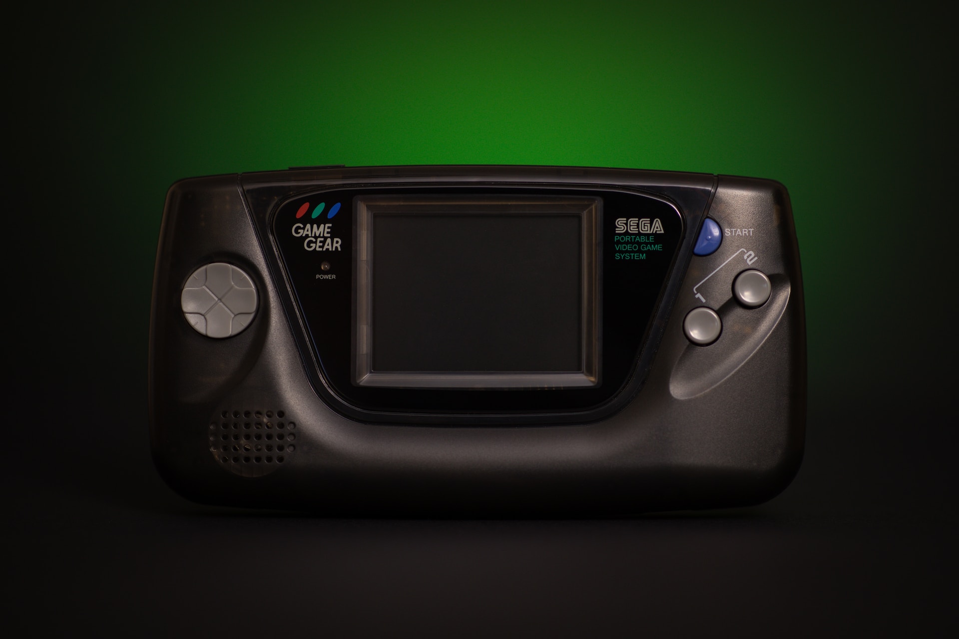 black game gear with green-black background