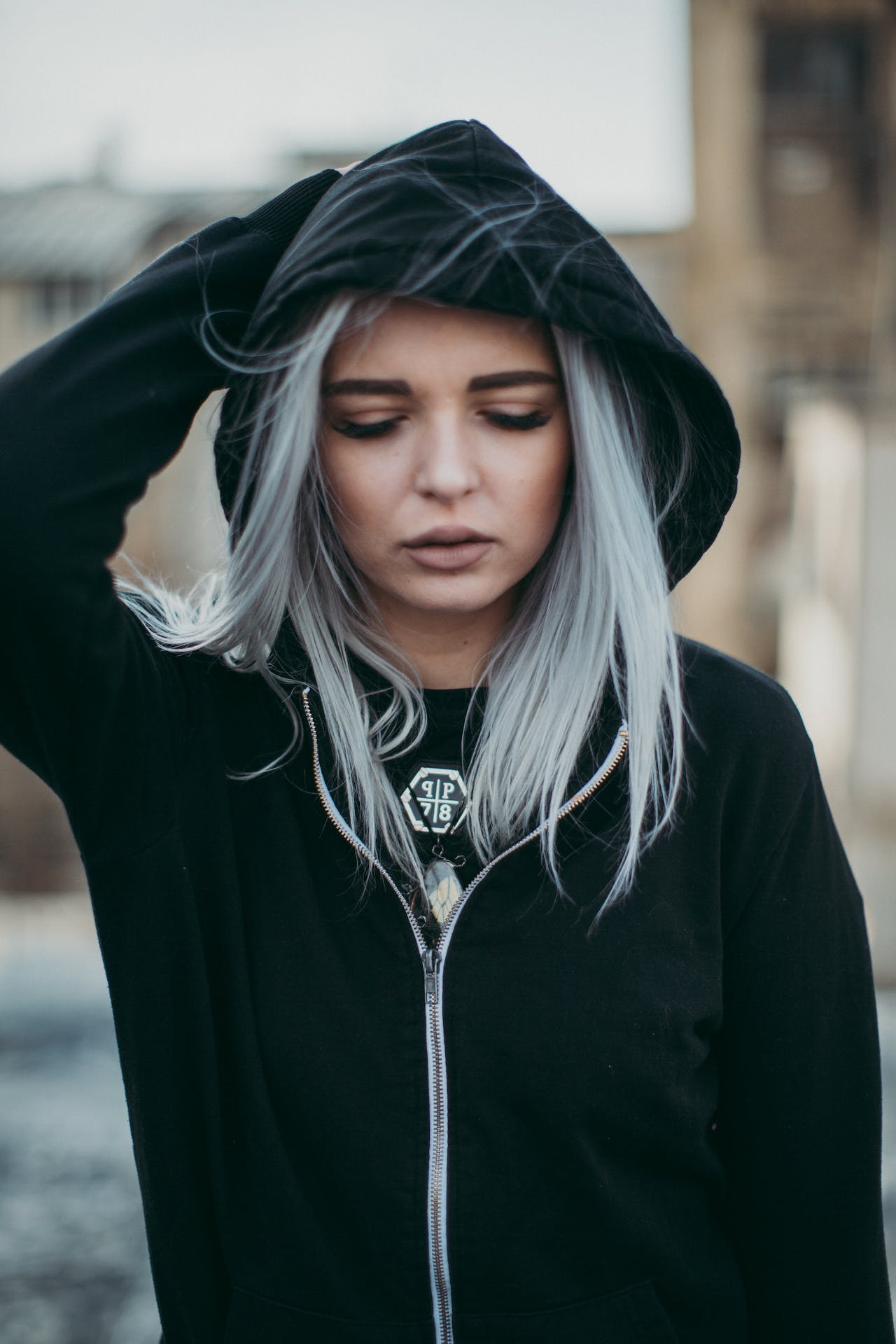 Woman with black hoodie