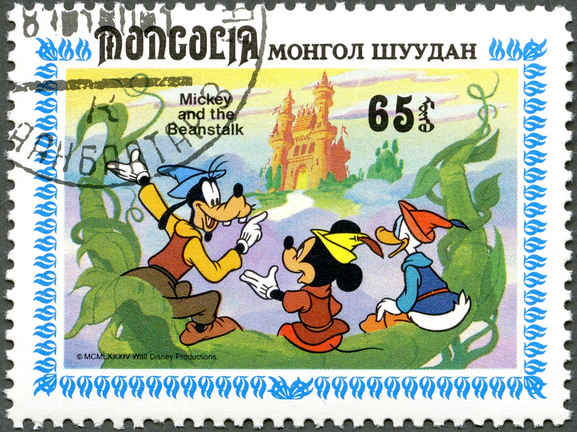 Goofy, Mickey Mouse, and Donald Duck on a postage stamp