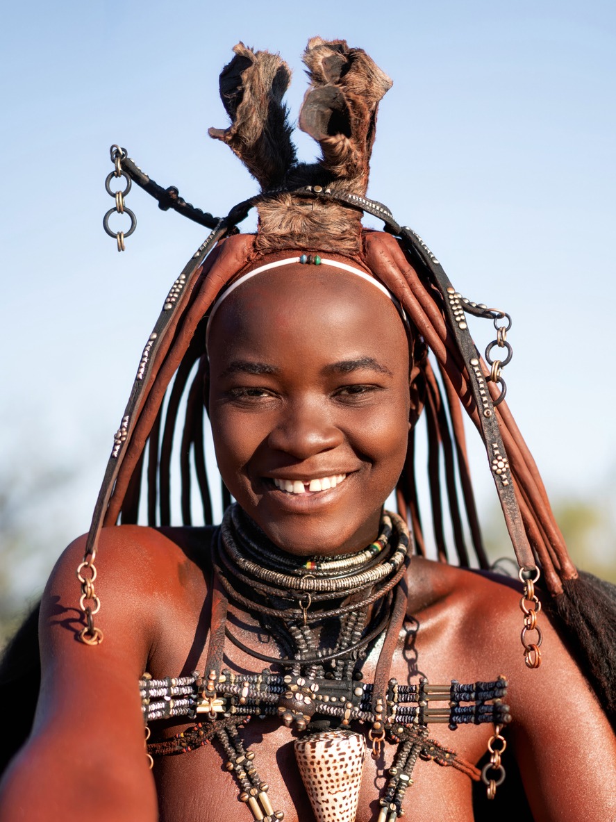 Happy Himba Woman Smiling Dressed in Traditional Style at Her Village in Namibia Africa
