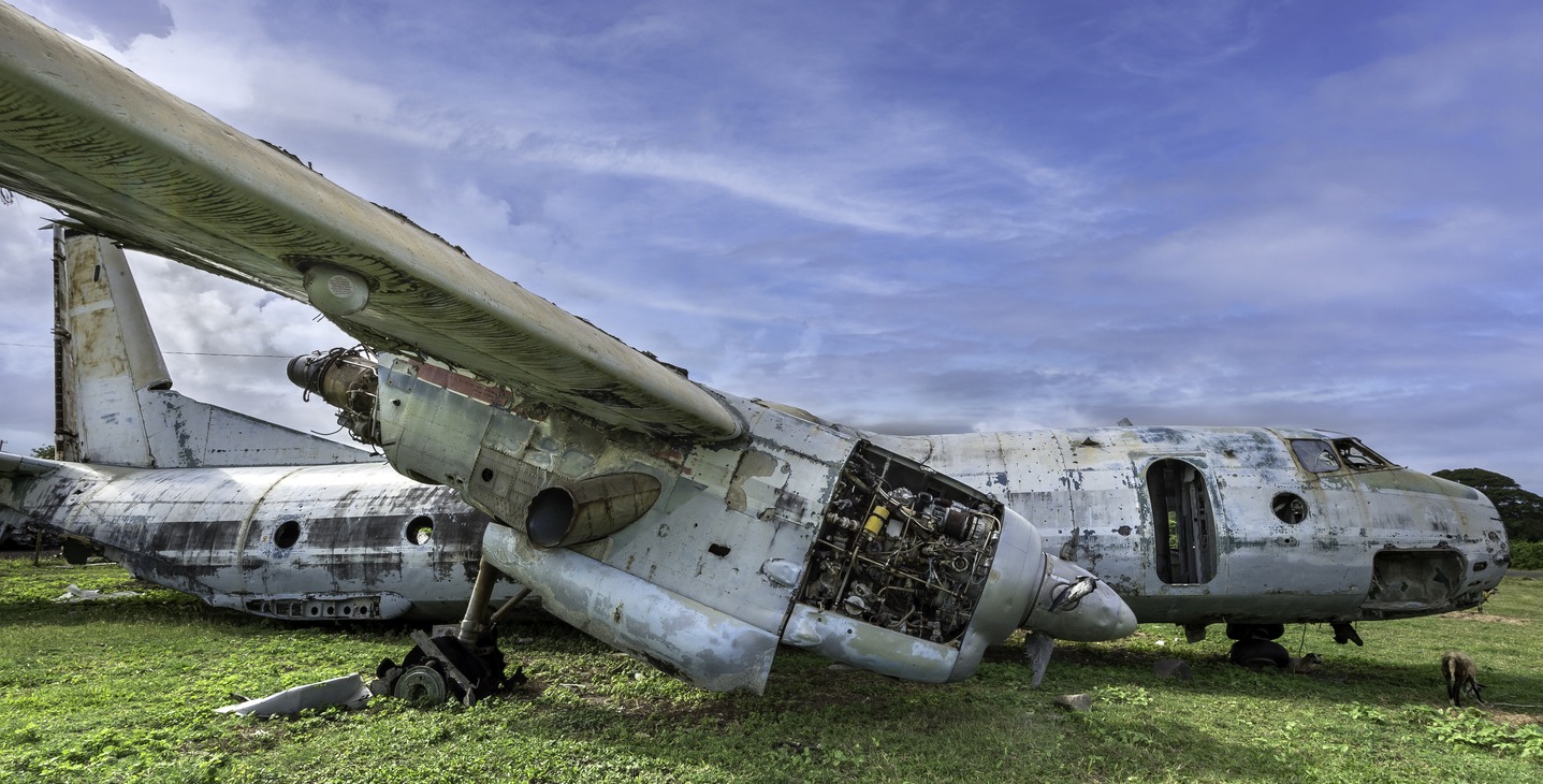 an abandoned plane on the field