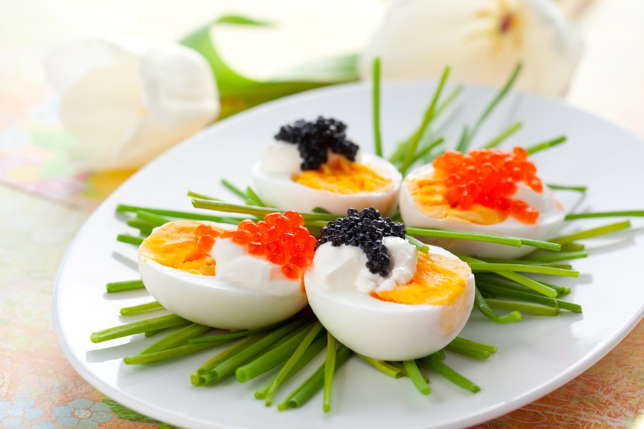 deviled eggs topped with caviar