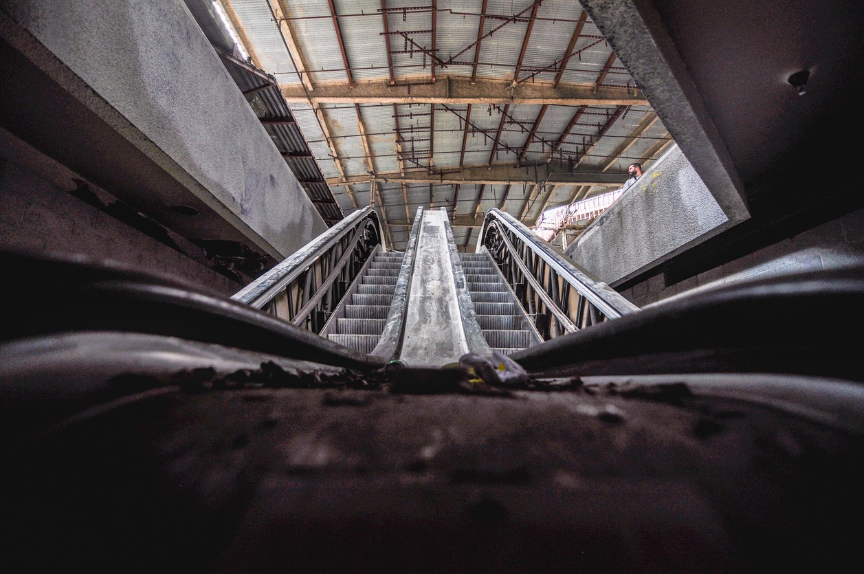 escalator inside an abandoned mall