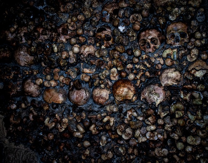 human bones in the depths of the Catacombs in Paris, France