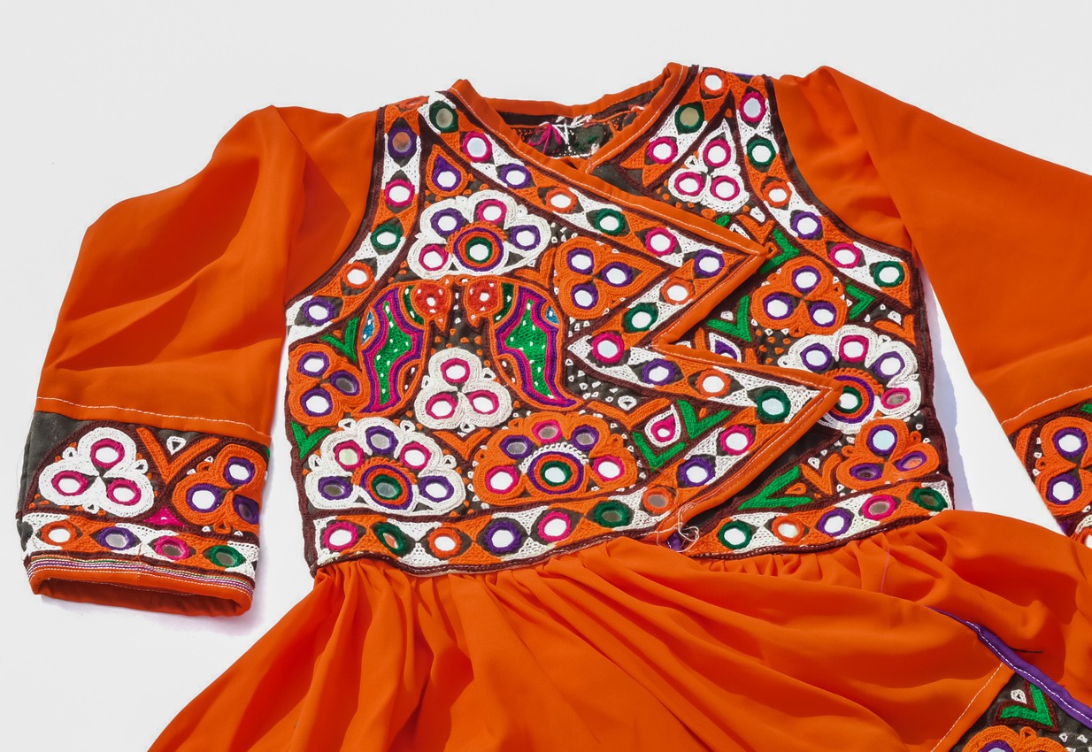 Indian dress featuring traditional pattern with mirror work