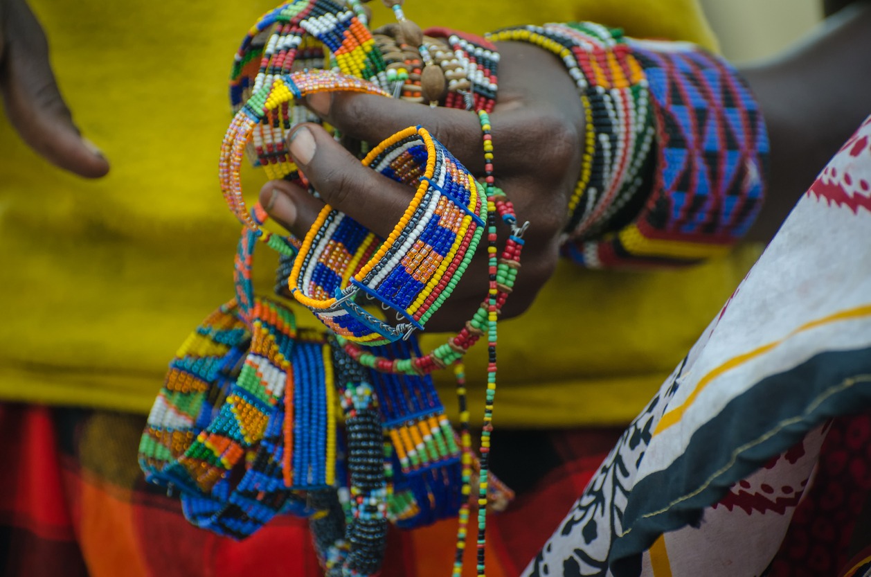 Masai woman selling handmade bracelet