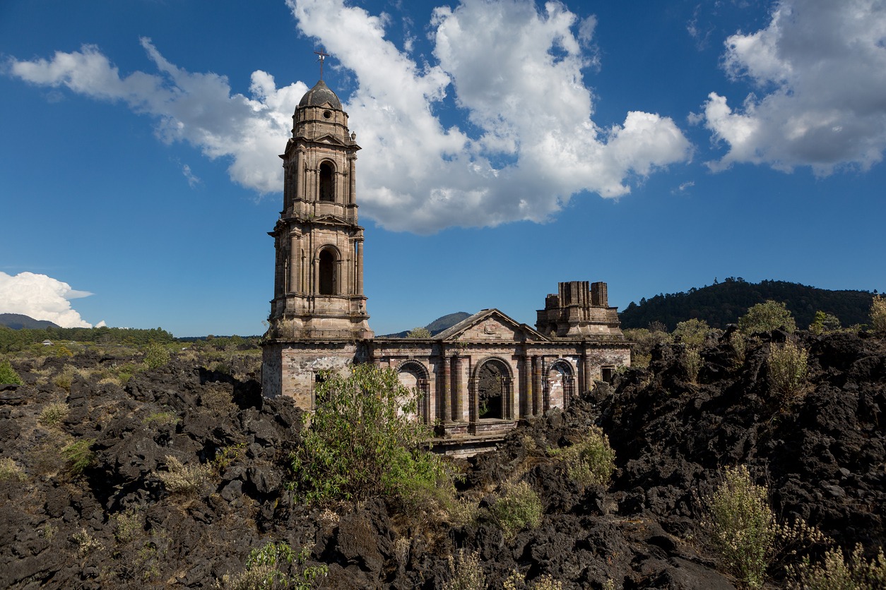 San Juan Parangaricutiro Church covered by lava flow from the Paricutin volcano in Mexico