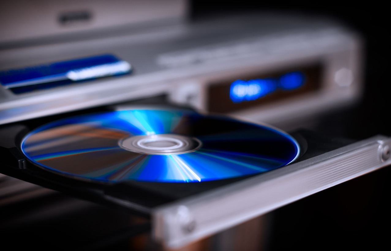 a DVD disc being inserted on a DVD player