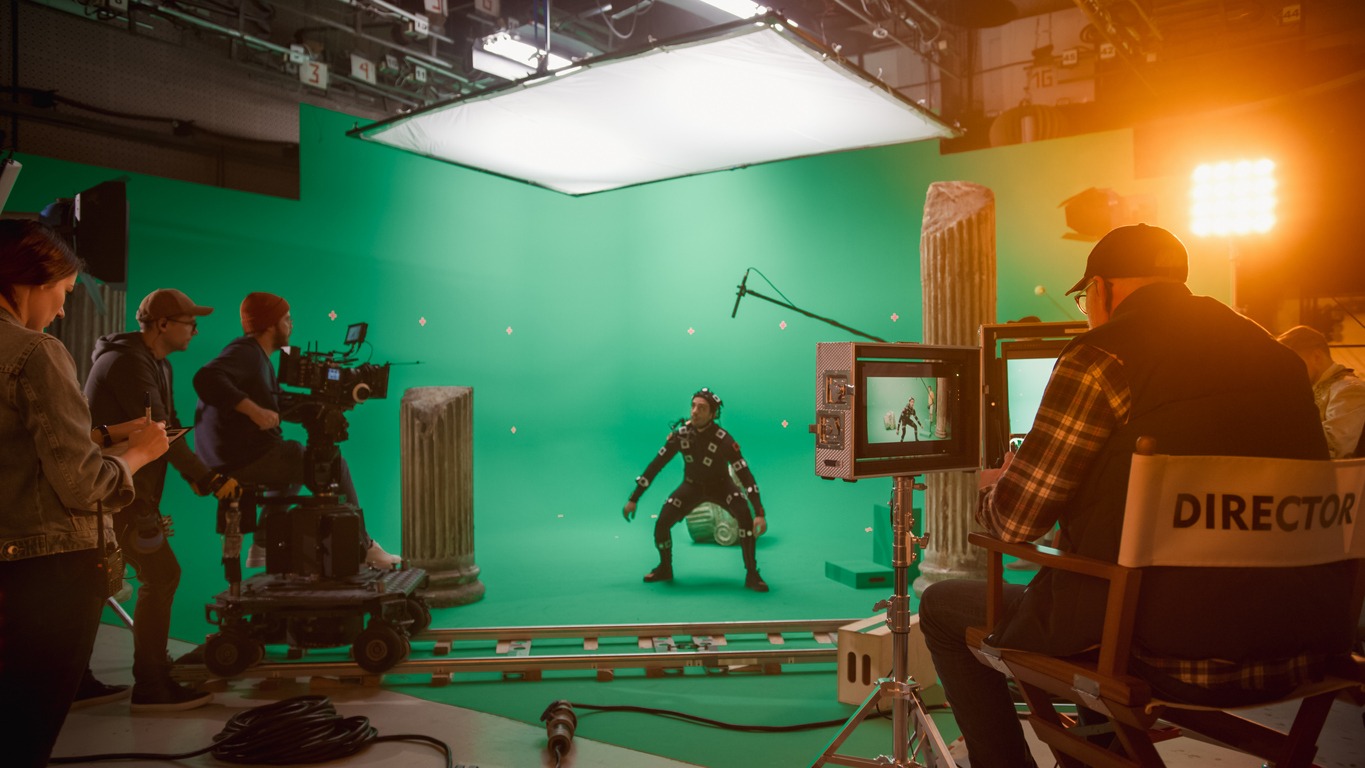 an actor in the studio wearing motion capture suit