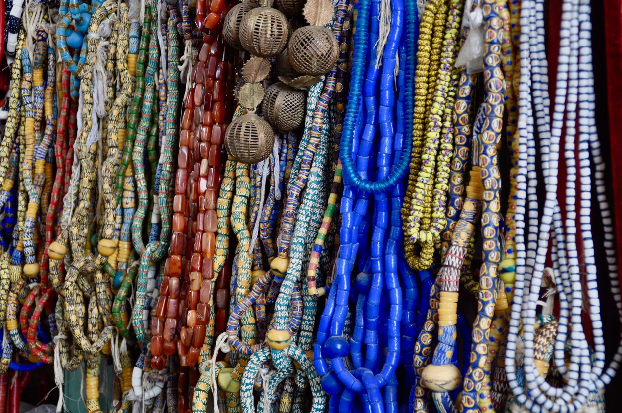 beads made of different materials on a market in Ghana