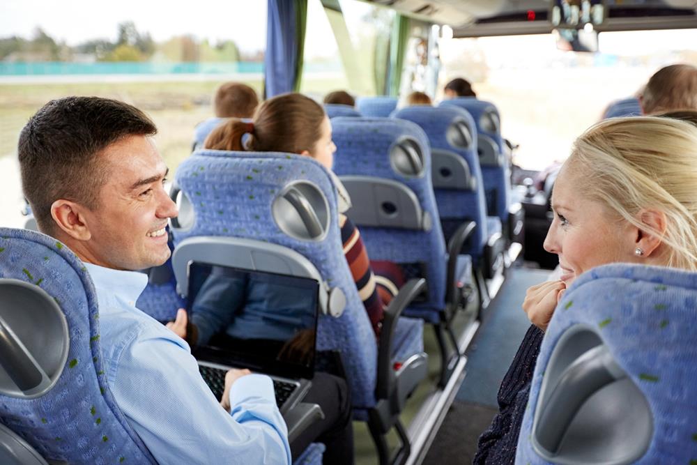 Business people inside a travel bus