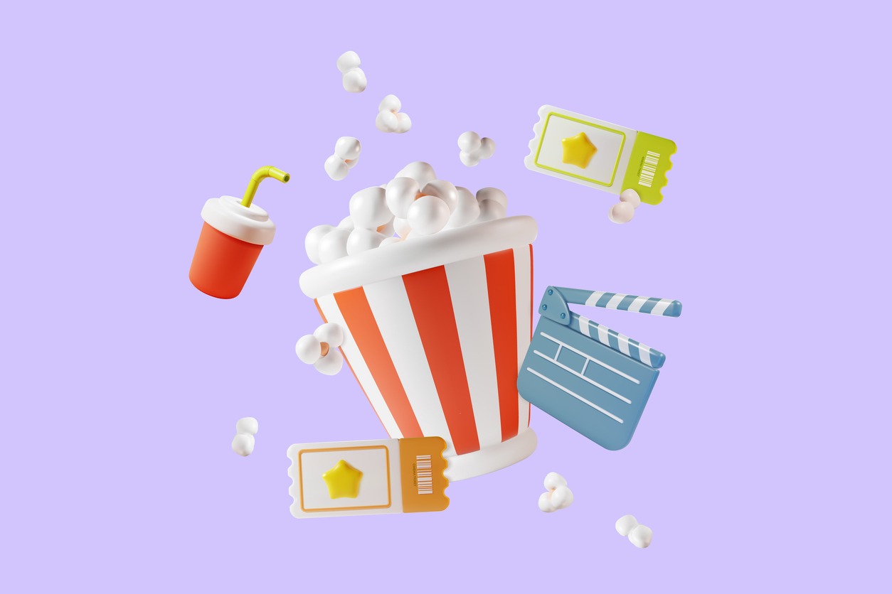cinema tickets, a film camera, and a bucket of popcorn