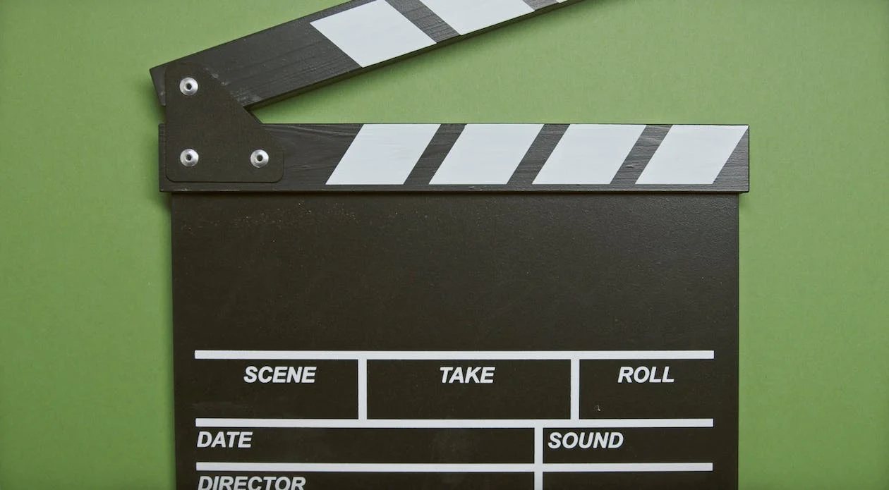 clapperboard on a green background