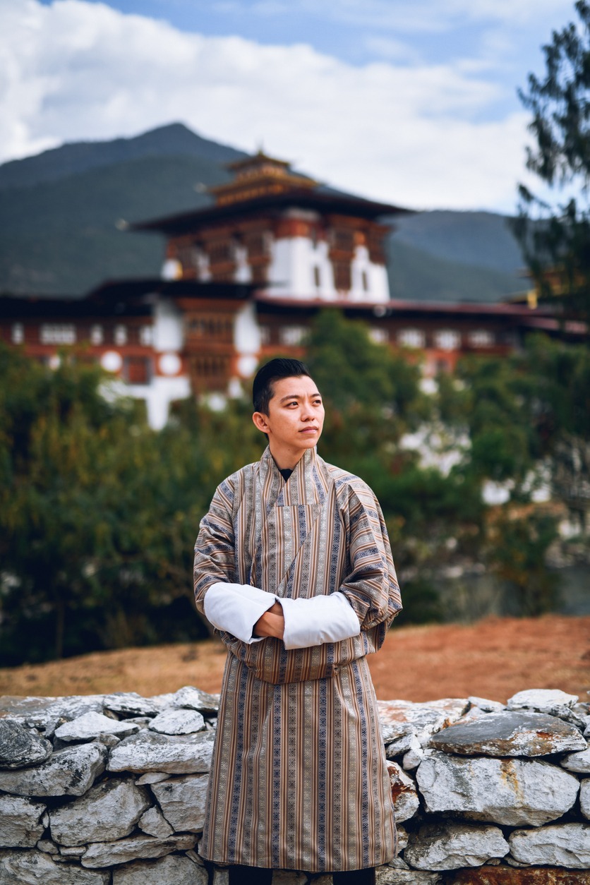 man dressed in Bhutan Traditional outfit called Gho