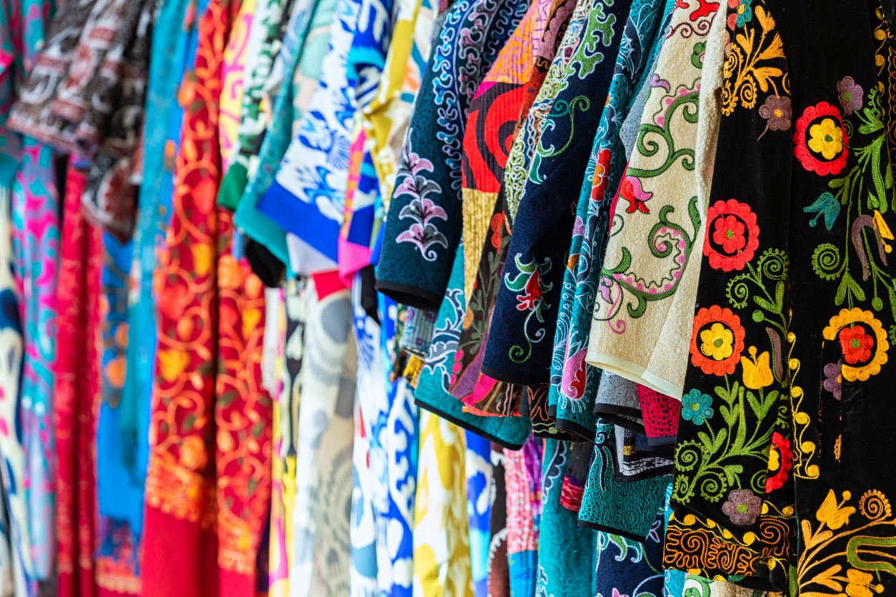 multicolored robes (chapan) in souvenir shop
