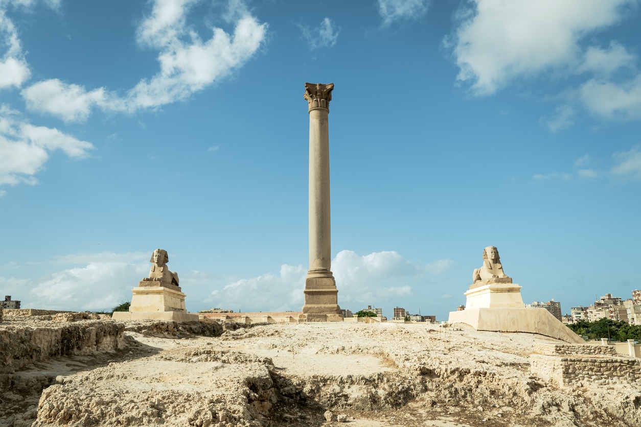 pompey pillar, ancient column and sphinx on the hill, Alexandria, Egypt