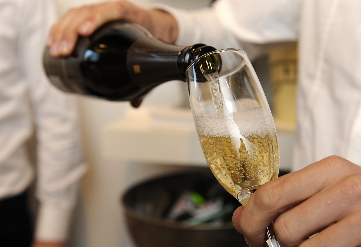 pouring some sparkling wine