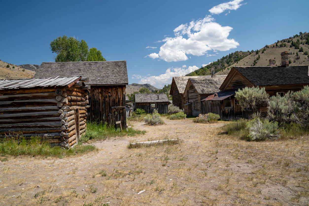 rows of abandoned homes and buildings in Bannack Ghost Town, Montana