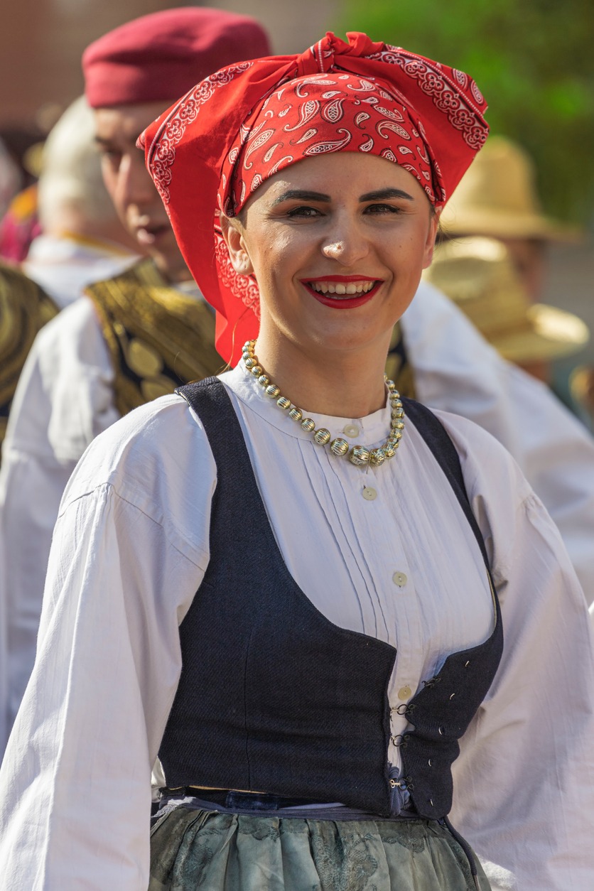 woman from Croatia in traditional costume with a headscarf 