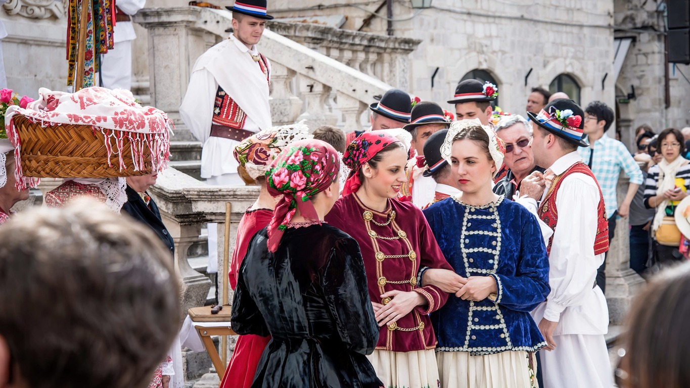 women dressed in national dress in Dubrovnik, Croatia