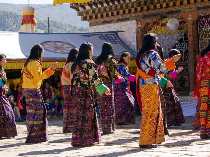 women in Bhutan wearing traditional Kira dresses