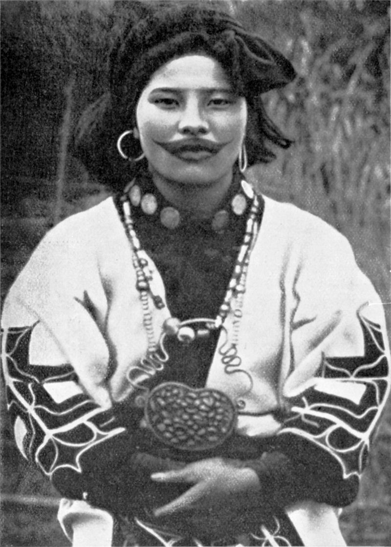 Ainu woman with a tattoo around the mouth, 1910