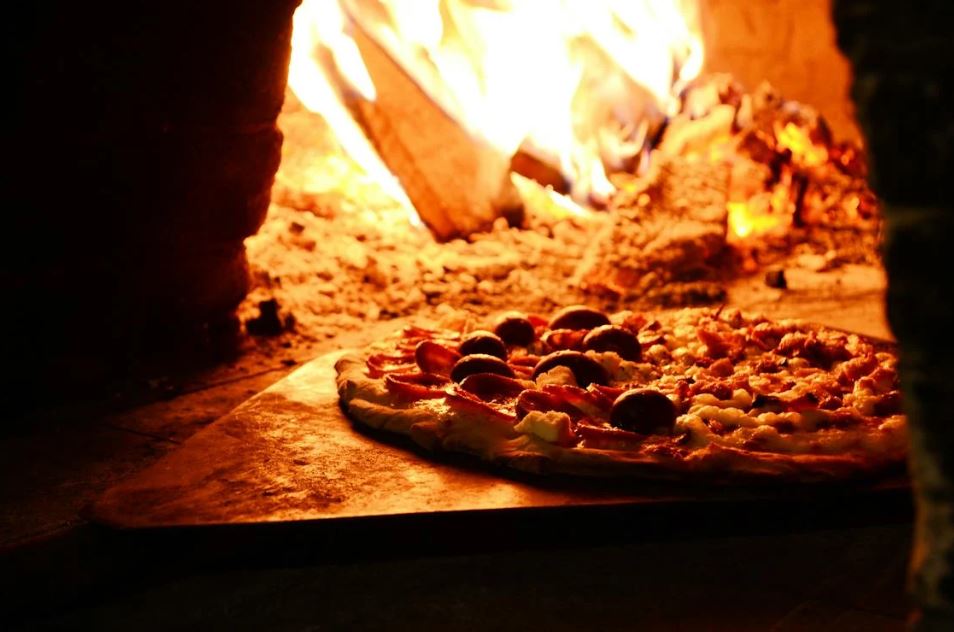 pizza near bonfire