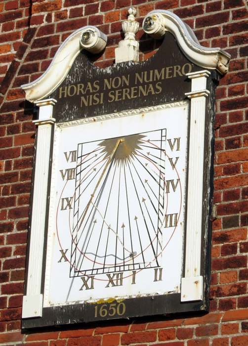 SSW facing, vertical declining sundial on the Moot Hall