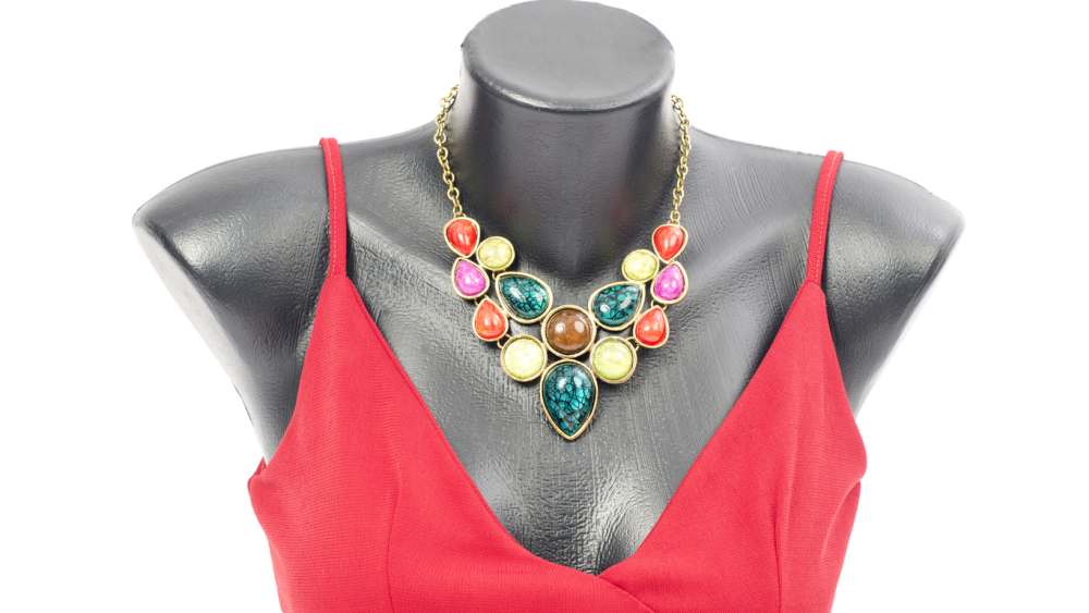 Mannequin wearing a colorful necklace
